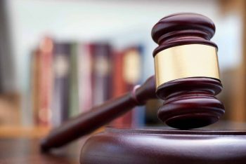 Close-up of a gavel on a desk