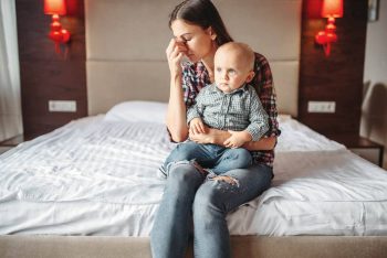 Photphoto of an upset woman and a child