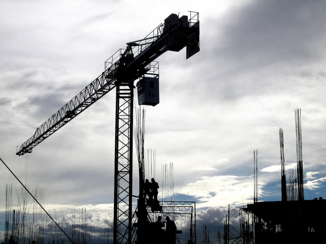 Crane with workers below it